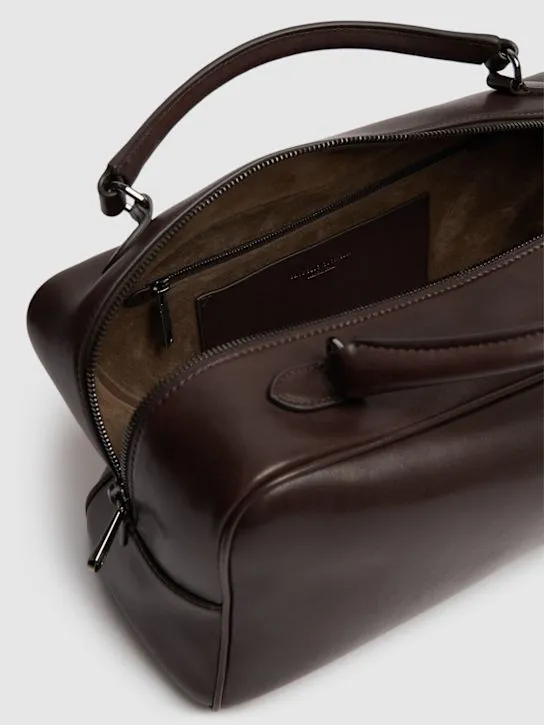 Brunello Cucinelli   Glossy leather top handle bag 